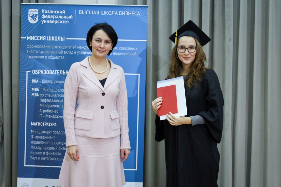 �eremony of delivering diplomas to graduates of master's programs