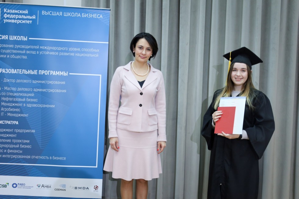 �eremony of delivering diplomas to graduates of master's programs