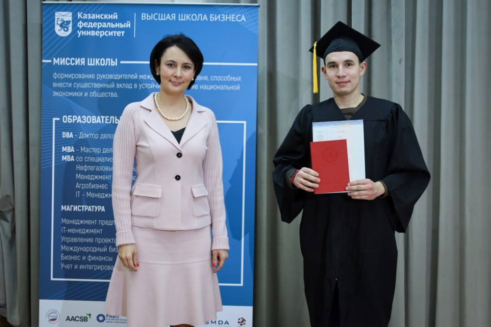�eremony of delivering diplomas to graduates of master's programs