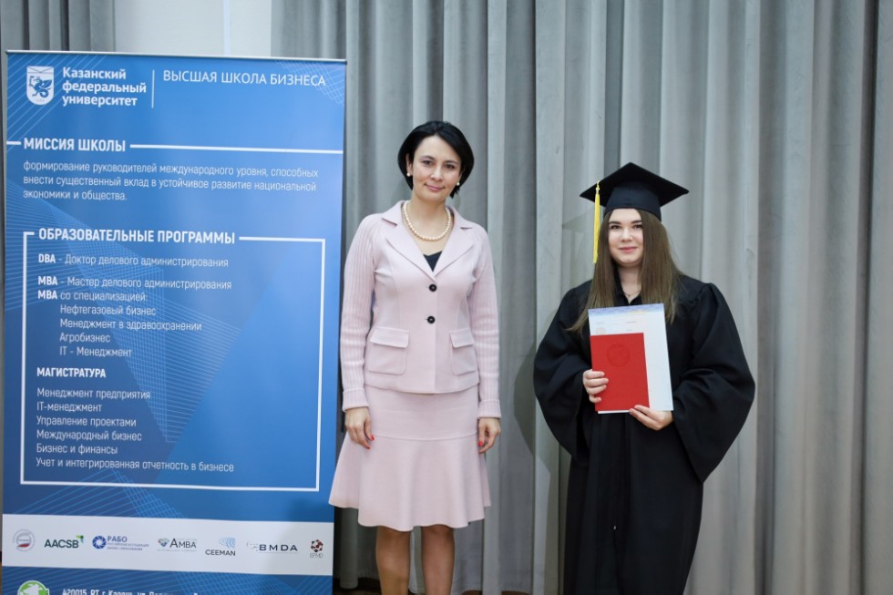 �eremony of delivering diplomas to graduates of master's programs