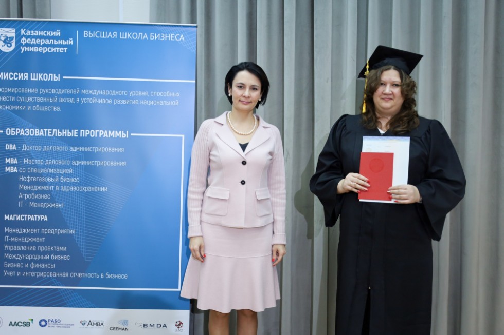 �eremony of delivering diplomas to graduates of master's programs
