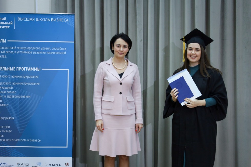 �eremony of delivering diplomas to graduates of master's programs