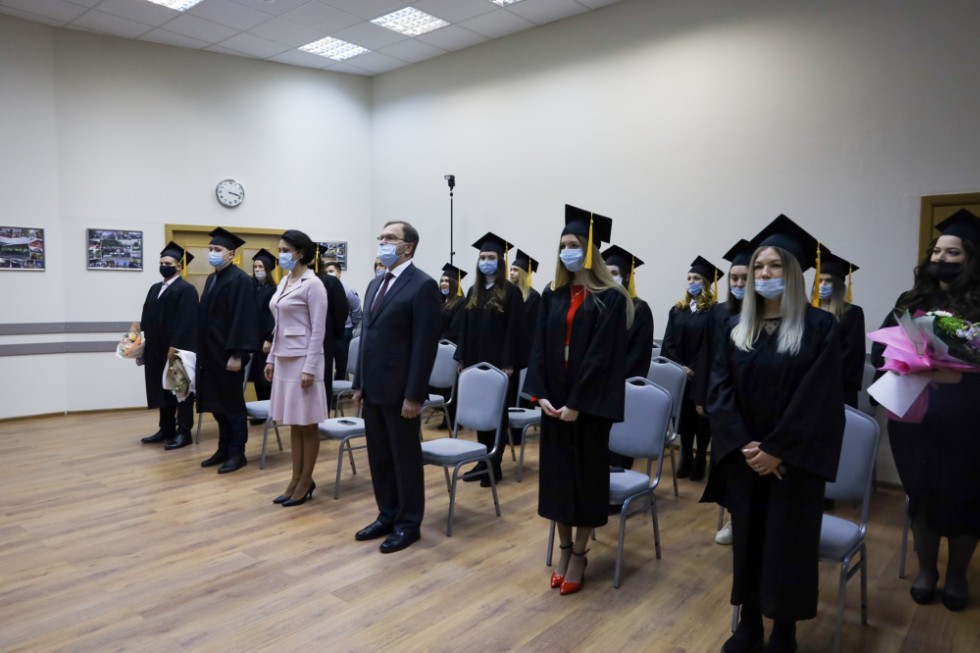 �eremony of delivering diplomas to graduates of master's programs