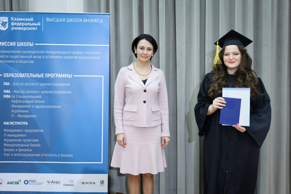 �eremony of delivering diplomas to graduates of master's programs