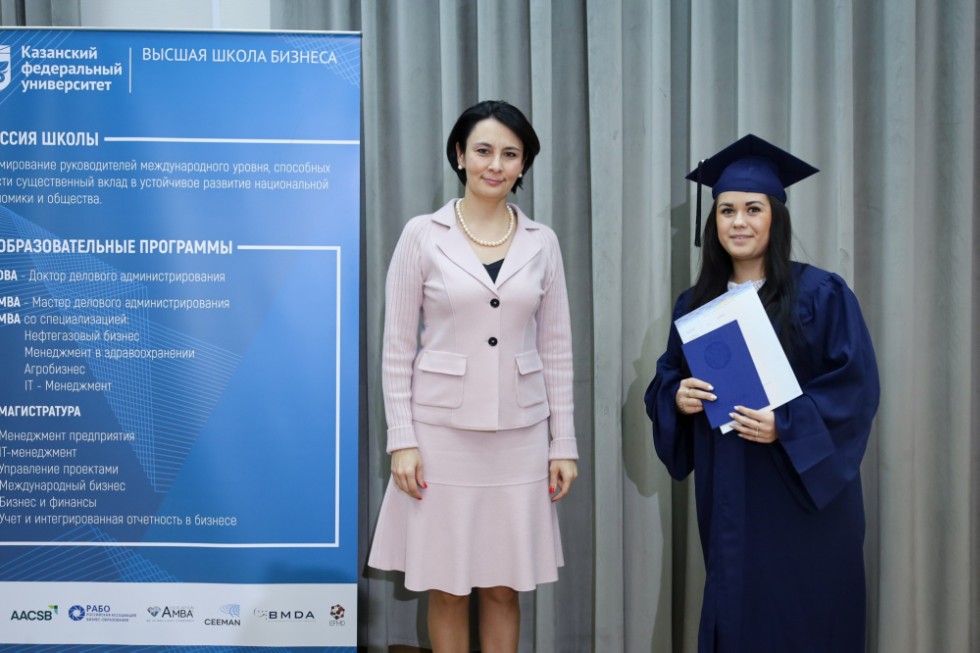�eremony of delivering diplomas to graduates of master's programs