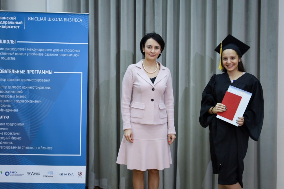 �eremony of delivering diplomas to graduates of master's programs