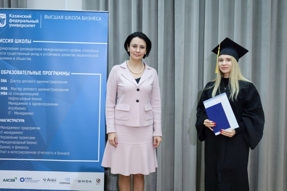 �eremony of delivering diplomas to graduates of master's programs