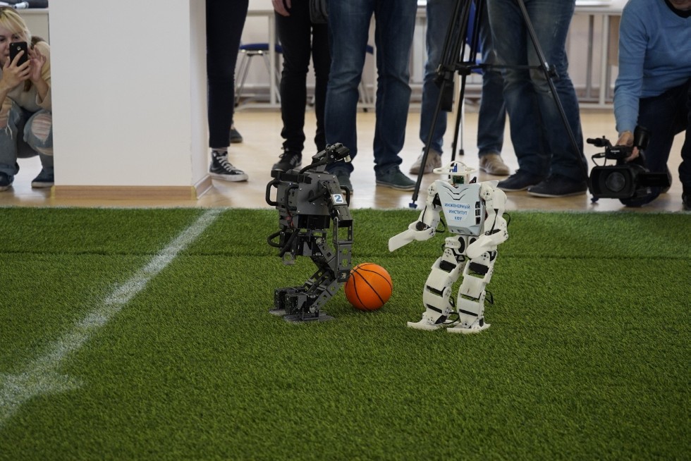 Robot football match held between two Kazan University teams to celebrate FIFA World Cup ,HSITIS, IE, robotics, footbal, FIFA World Cup