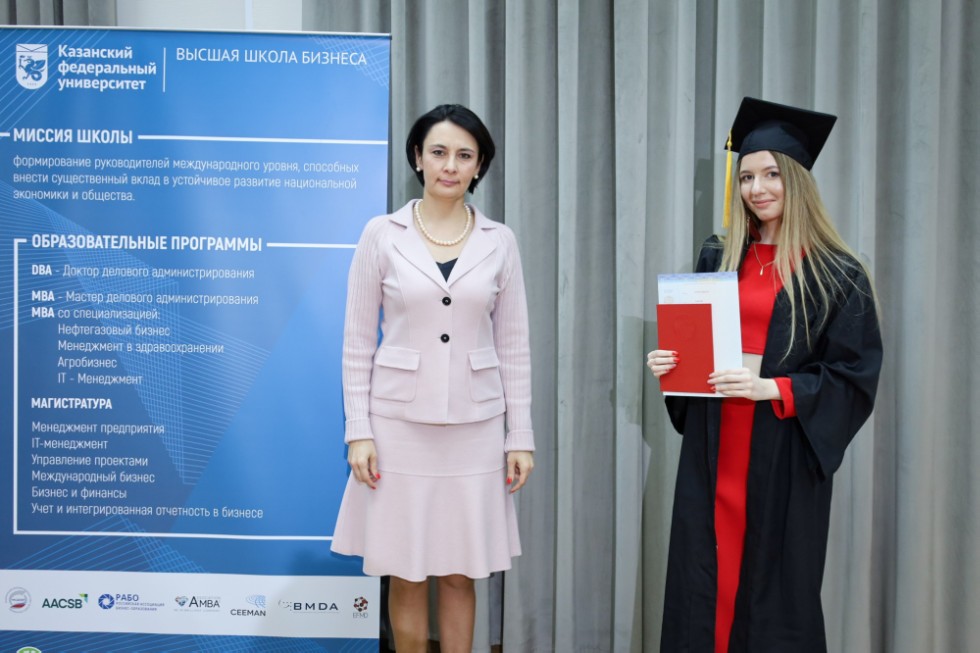 �eremony of delivering diplomas to graduates of master's programs