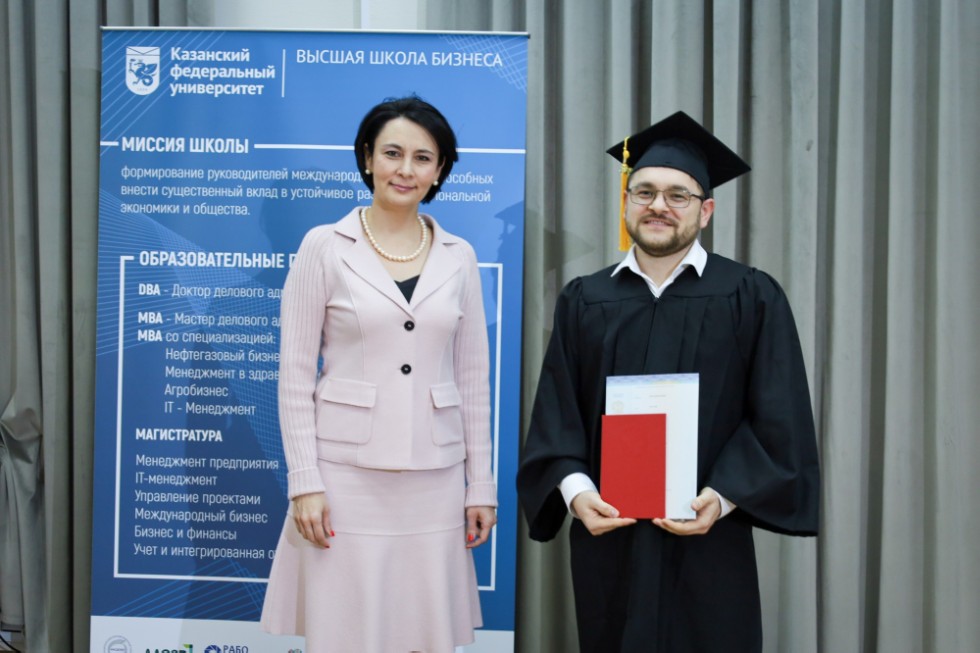 �eremony of delivering diplomas to graduates of master's programs
