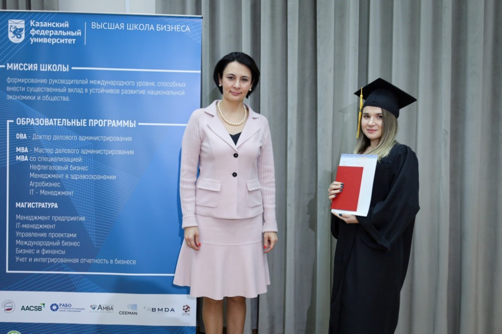 �eremony of delivering diplomas to graduates of master's programs